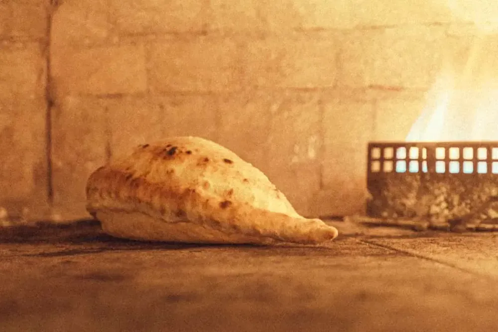 Calzone Dolce baking in Bandanna’s wood-fired oven.