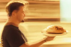 A freshly baked Calzone Dolce being carried from the Bandanna kitchen.